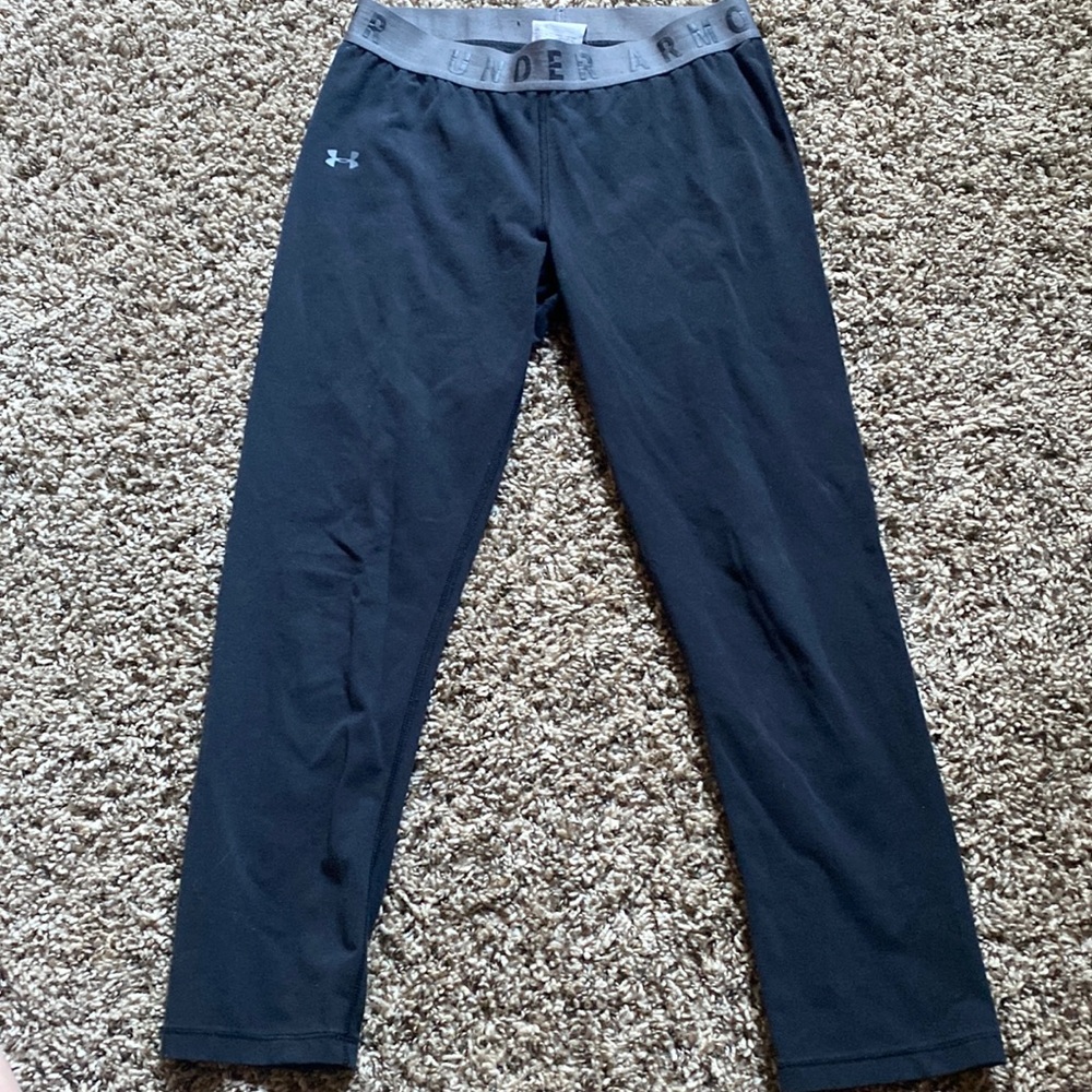 Small fits like medium under armor Capri leggings